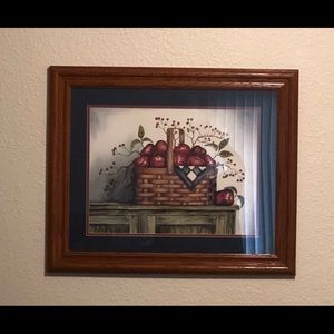 Framed picture of apples in a basket